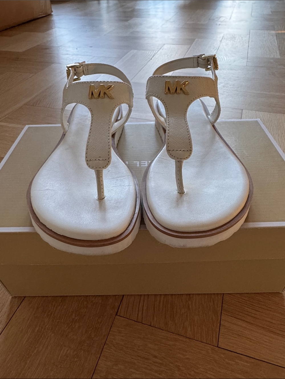 Michael Kors Cream Leather T-Strap Sandals with Gold MK Accent